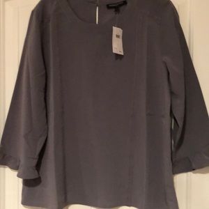 Pretty gray shell with lace trim !